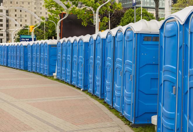 a line of brightly-colored portable restrooms, perfect for outdoor festivals and concerts in Altadena, CA