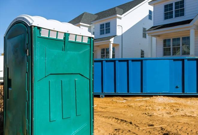 practical and convenient porta potties at a bustling work site